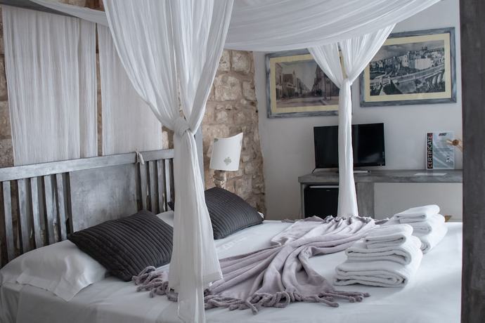 Imagen de la habitación del Antico Mondo Rooms and Suites. Foto 17