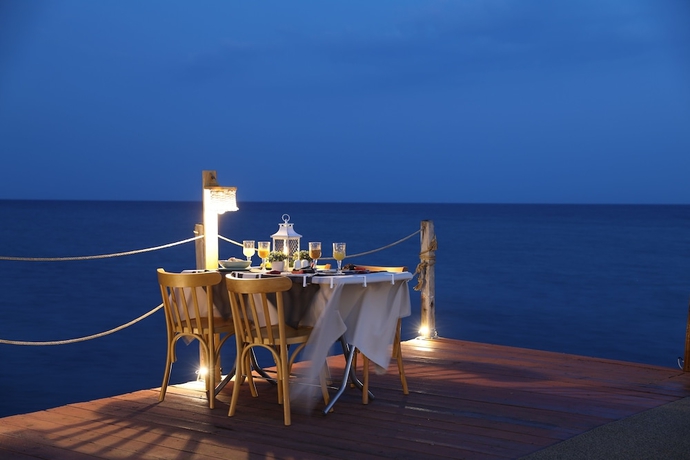 Imagen del bar/restaurante del Antique Beach and Bungalow. Foto 9