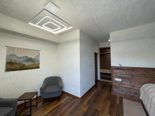 Imagen de la habitación del Apaga Resort. Foto 20