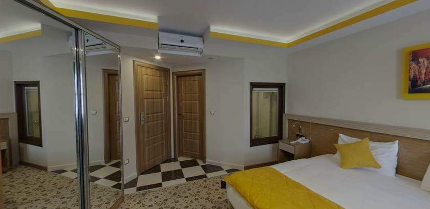 Imagen de la habitación del Apameia Hotel. Foto 7