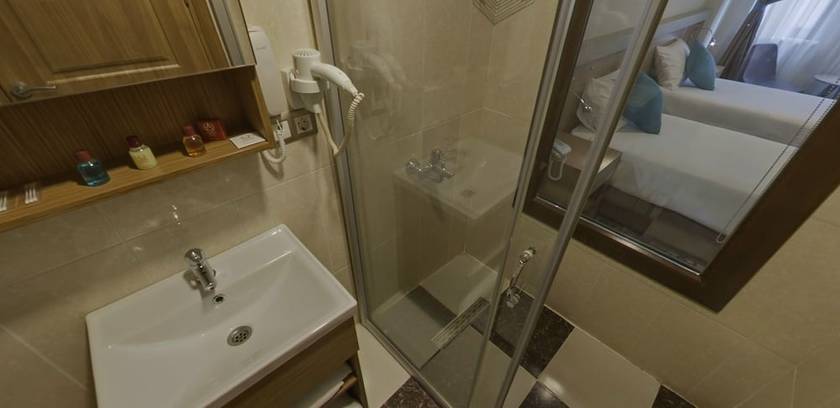 Imagen de la habitación del Apameia Hotel. Foto 14