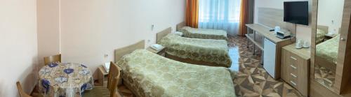 Imagen de la habitación del Apart Hotel Central Razgrad. Foto 18