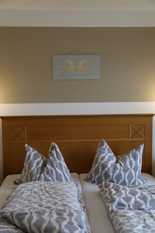 Imagen de la habitación del Apart Hotel Goldener Hahn Baiersbronn, Ferienwohnungen | Fr&uuml;hst&uuml;ck, Sauna and Indoorpool. Foto 4