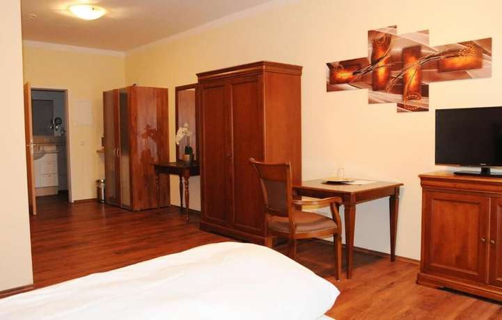 Imagen de la habitación del Apart Hotel Scheuer. Foto 2