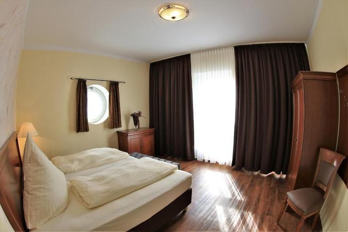 Imagen de la habitación del Apart Hotel Scheuer. Foto 17