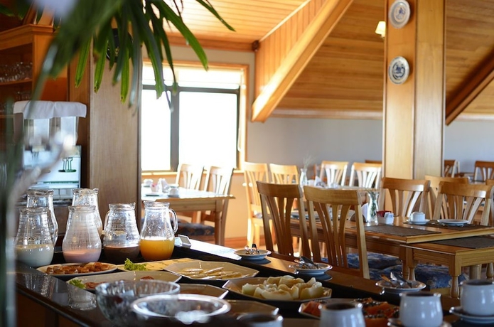 Imagen del bar/restaurante del Apart Hotel Villa Moura Cassino. Foto 4