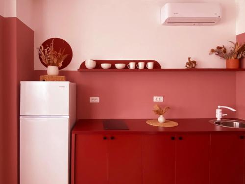 Imagen de la habitación del ApartHotel - Colorful by the Sea. Foto 11