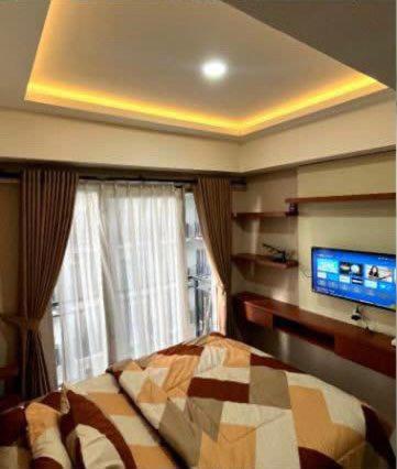 Imagen de la habitación del Apartemen Grand Asia Afrika. Foto 4