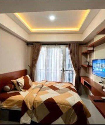 Imagen de la habitación del Apartemen Grand Asia Afrika. Foto 6
