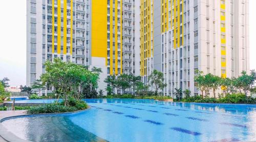 Imagen de la habitación del Apartemen The Springlake Summarecon by Cheapinn. Foto 8