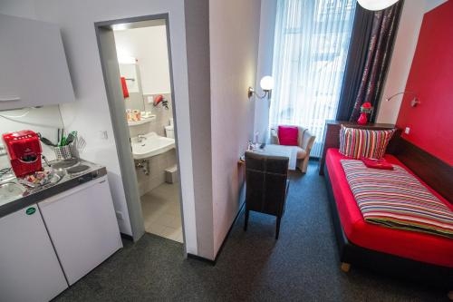 Imagen de la habitación del Aparthotel Am M&uuml;nzplatz. Foto 7