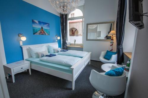 Imagen de la habitación del Aparthotel Am M&uuml;nzplatz. Foto 8
