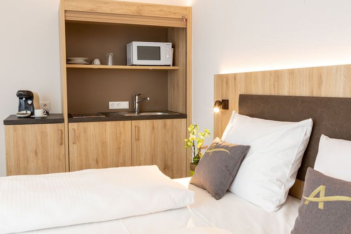 Imagen de la habitación del Aparthotel Am Pfaffenstein. Foto 4