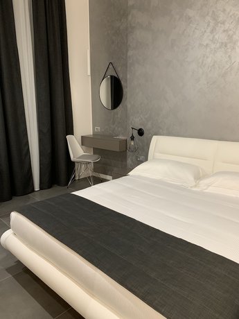 Imagen de la habitación del Aparthotel Bossi. Foto 6