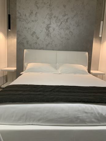 Imagen de la habitación del Aparthotel Bossi. Foto 8