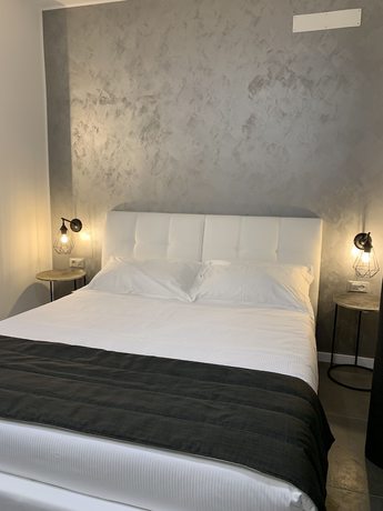 Imagen de la habitación del Aparthotel Bossi. Foto 9