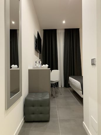 Imagen de la habitación del Aparthotel Bossi. Foto 13