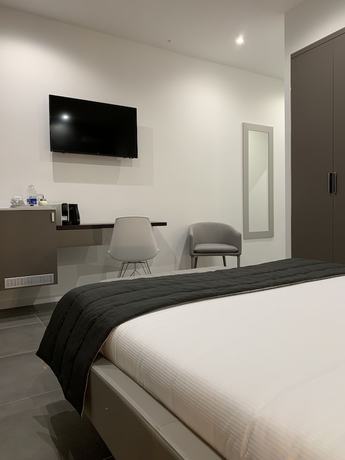 Imagen de la habitación del Aparthotel Bossi. Foto 16