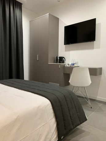 Imagen de la habitación del Aparthotel Bossi. Foto 18