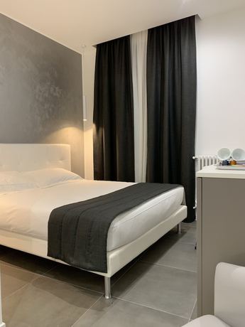 Imagen de la habitación del Aparthotel Bossi. Foto 19