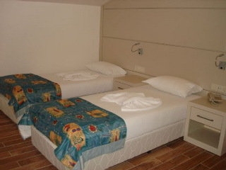 Imagen de la habitación del Aparthotel Caligo. Foto 9