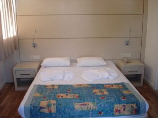 Imagen de la habitación del Aparthotel Caligo. Foto 10