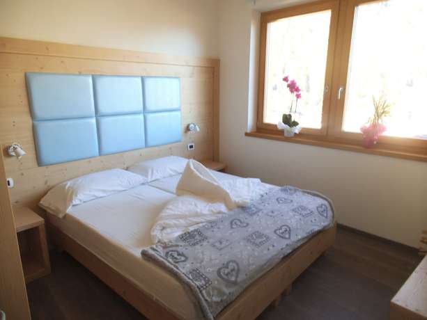 Imagen de la habitación del Aparthotel Dolomites LivingandRelax. Foto 4