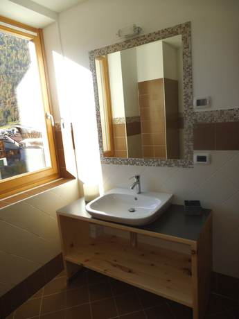 Imagen de la habitación del Aparthotel Dolomites LivingandRelax. Foto 11