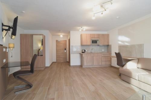 Imagen de la habitación del Aparthotel Donaustern. Foto 8