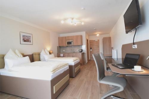 Imagen de la habitación del Aparthotel Donaustern. Foto 9