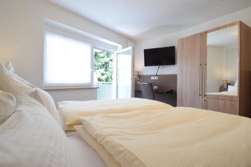 Imagen de la habitación del Aparthotel Donaustern. Foto 10