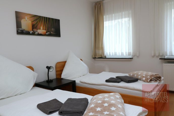 Imagen de la habitación del Aparthotel Kompass. Foto 13