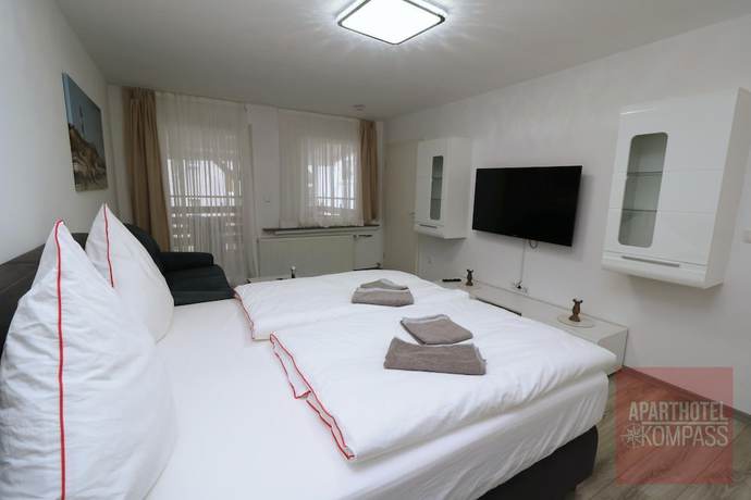 Imagen de la habitación del Aparthotel Kompass. Foto 16