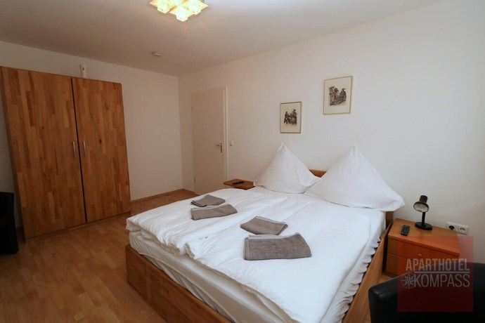 Imagen de la habitación del Aparthotel Kompass. Foto 20