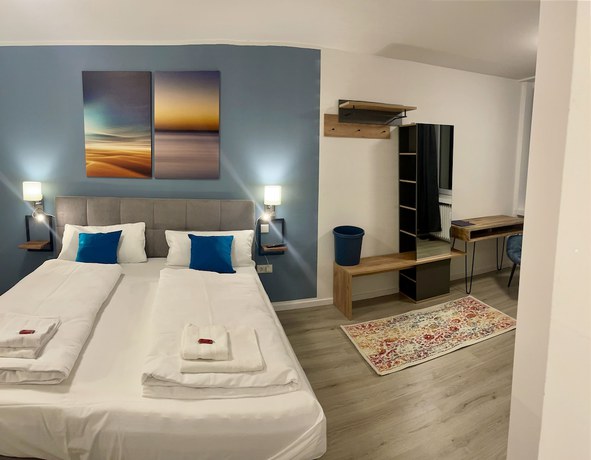Imagen de la habitación del Aparthotel Neum&uuml;nster City. Foto 8
