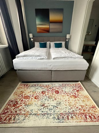 Imagen de la habitación del Aparthotel Neum&uuml;nster City. Foto 15