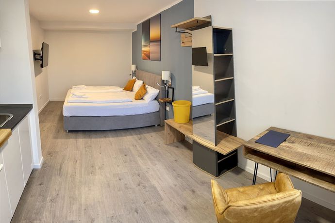 Imagen de la habitación del Aparthotel Neum&uuml;nster City. Foto 16