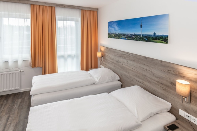 Imagen de la habitación del Aparthotel Oberfeld West. Foto 6