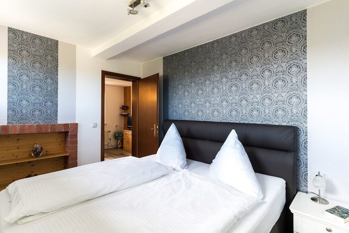 Imagen de la habitación del Aparthotel Pension Haus Windhook. Foto 10