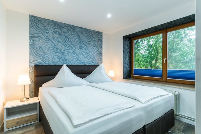 Imagen de la habitación del Aparthotel Pension Haus Windhook. Foto 11