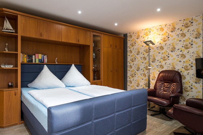 Imagen de la habitación del Aparthotel Pension Haus Windhook. Foto 15