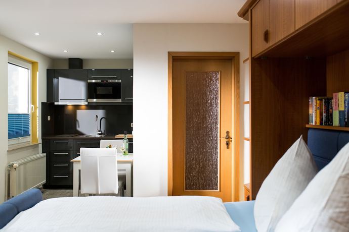 Imagen de la habitación del Aparthotel Pension Haus Windhook. Foto 18