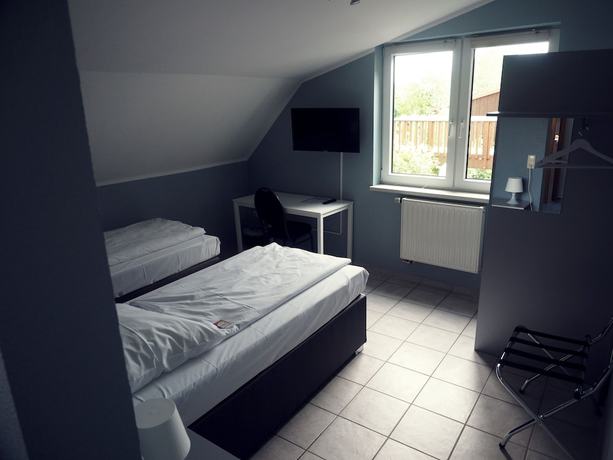 Imagen de la habitación del Aparthotel Sarstedter Hof. Foto 15