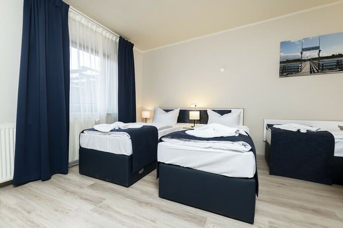 Imagen de la habitación del Aparthotel Stralsund. Foto 13