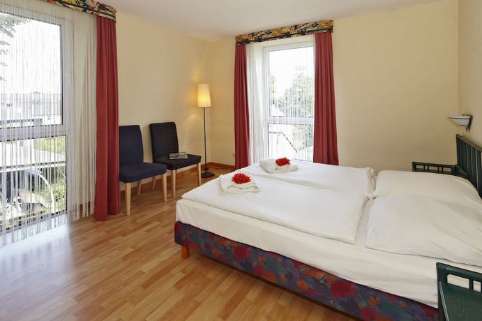 Imagen de la habitación del Aparthotel Tropenhaus Bansin. Foto 8