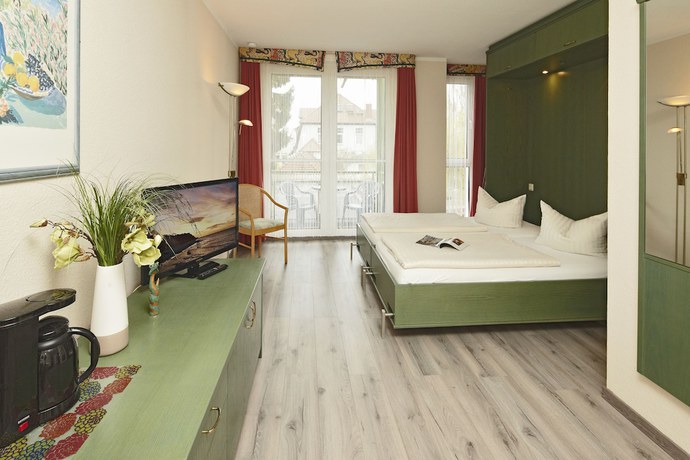 Imagen de la habitación del Aparthotel Tropenhaus Bansin. Foto 18