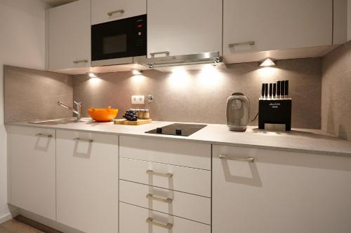 Imagen de la habitación del Aparthotel Tu-tu. Foto 6