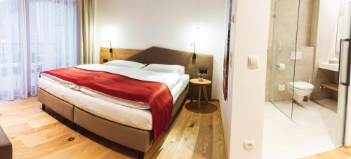 Imagen de la habitación del Aparthotel Ursprung. Foto 7