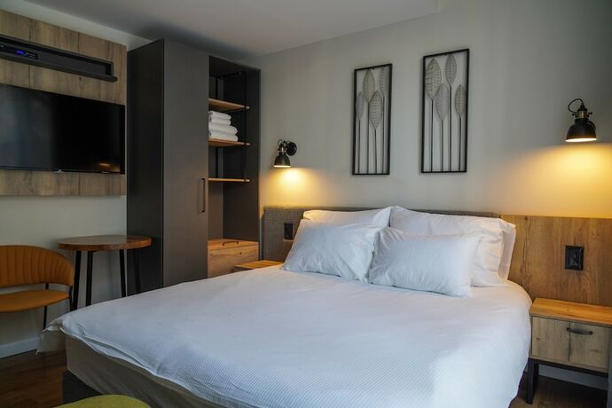 Imagen de la habitación del Apartique Hotel. Foto 12