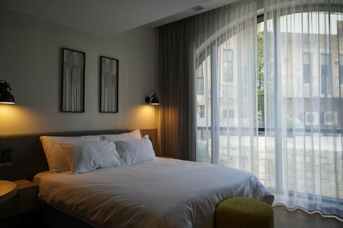 Imagen de la habitación del Apartique Hotel. Foto 16